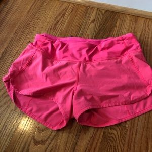 Neon pink lululemon athletic shorts